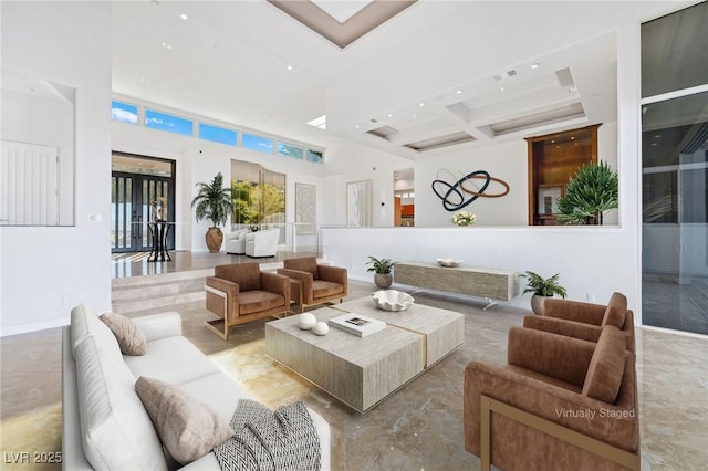 living area with recessed lighting, a high ceiling, coffered ceiling, a wealth of natural light, and beam ceiling