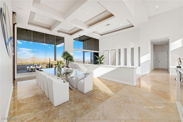 living room with visible vents, baseboards, coffered ceiling, a high ceiling, and beam ceiling