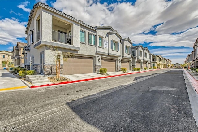 view of road with sidewalks, curbs, and a residential view