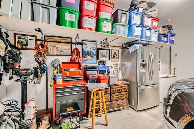 interior space featuring stainless steel fridge