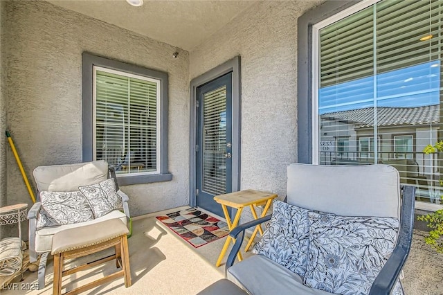 view of patio / terrace with a balcony