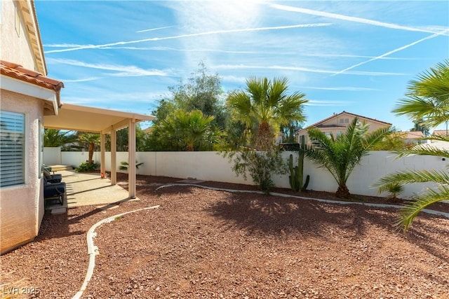 view of yard with a fenced backyard