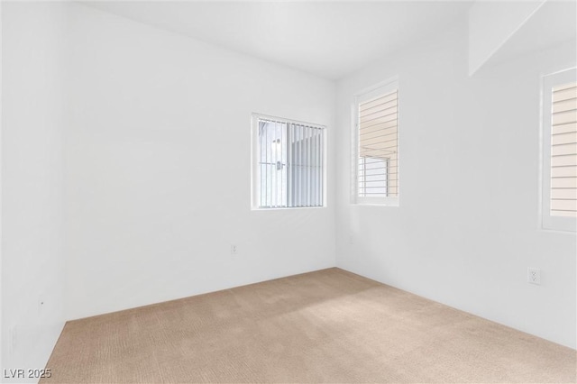 empty room with carpet flooring