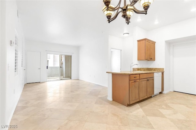 kitchen with a sink, light stone counters, recessed lighting, an inviting chandelier, and dishwasher