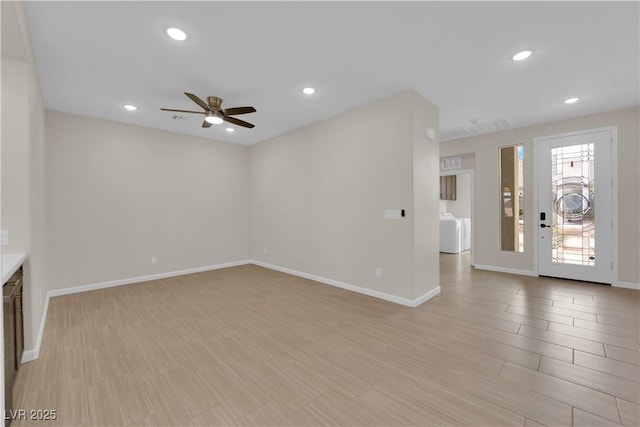 unfurnished living room featuring light wood-type flooring, baseboards, a ceiling fan, and recessed lighting