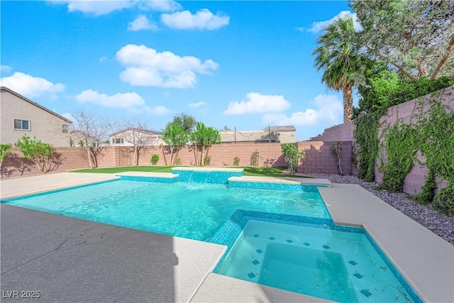 view of pool featuring a fenced backyard and a pool with connected hot tub