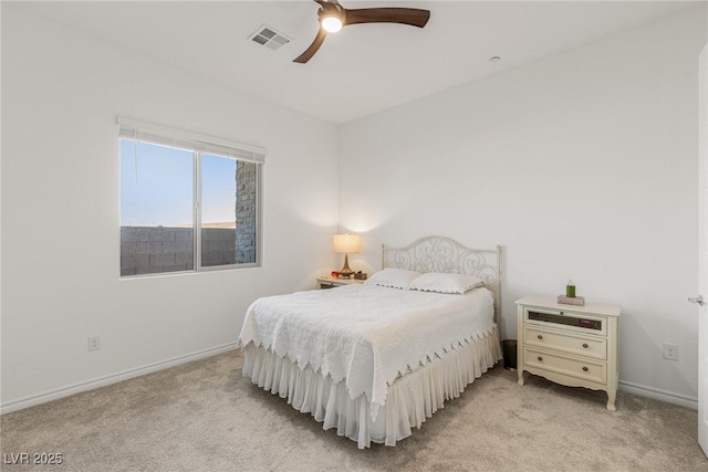 bedroom featuring light carpet, baseboards, visible vents, and a ceiling fan