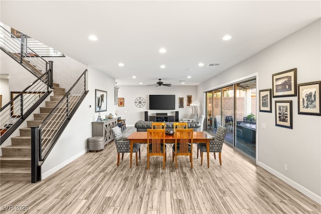 dining area with recessed lighting, visible vents, stairway, and light wood finished floors