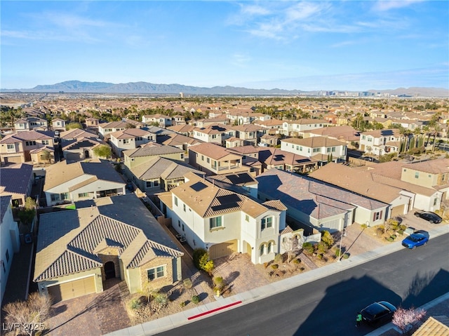 bird's eye view with a mountain view and a residential view