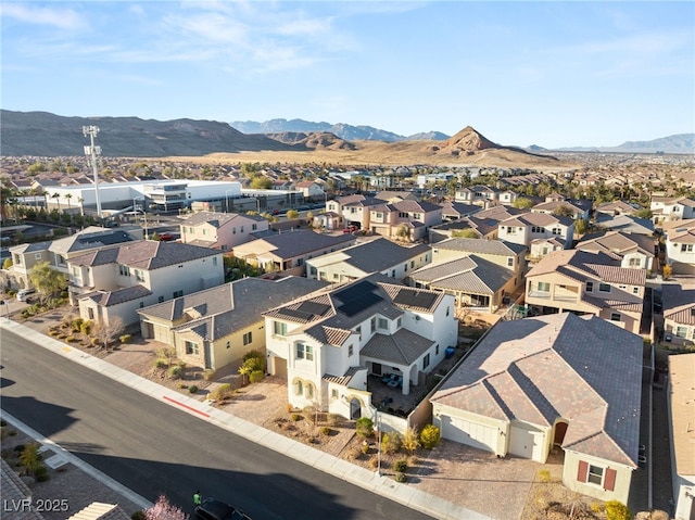 aerial view featuring a residential view and a mountain view