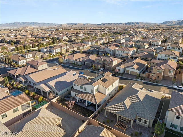 bird's eye view with a residential view and a mountain view