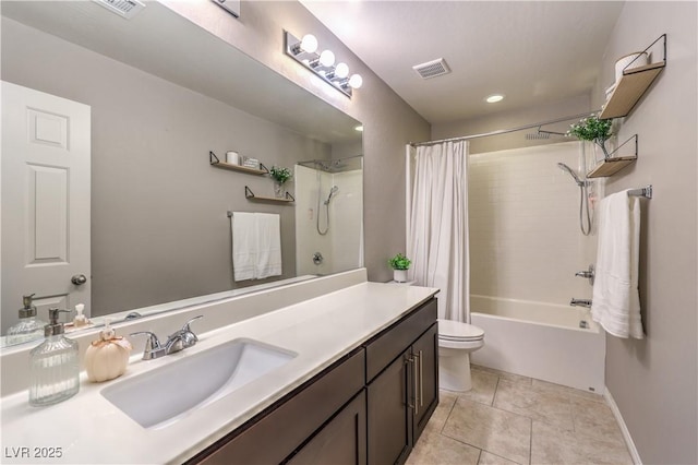 bathroom with tile patterned flooring, toilet, vanity, visible vents, and shower / tub combo with curtain