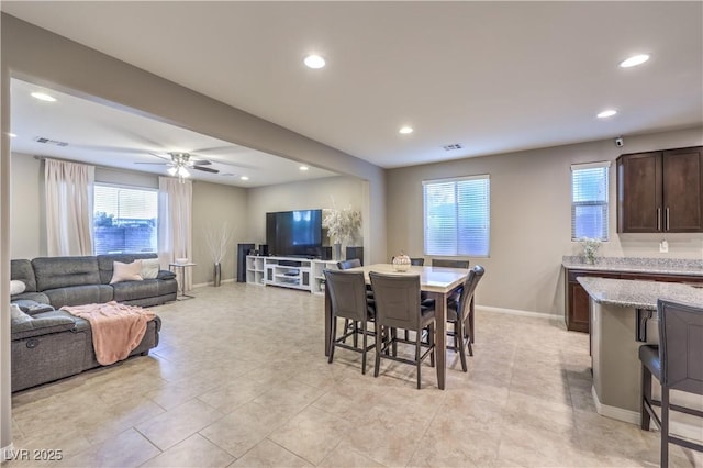 dining area featuring a ceiling fan, recessed lighting, visible vents, and baseboards