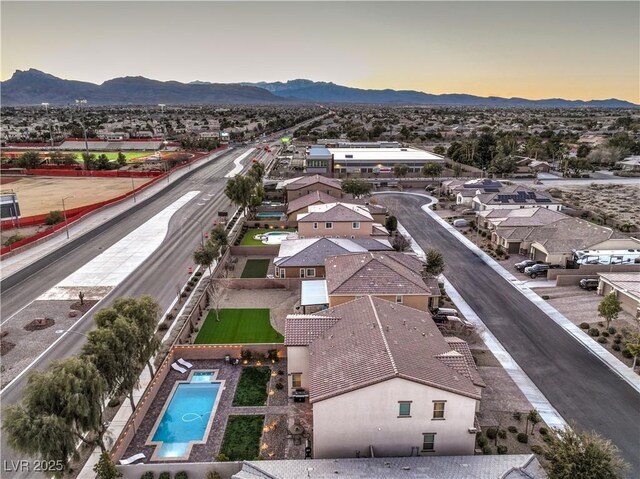 bird's eye view with a mountain view