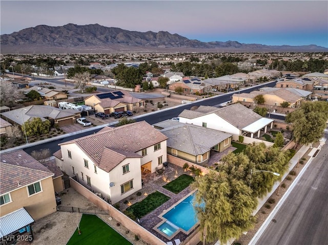 aerial view featuring a residential view and a mountain view