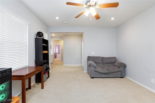 sitting room with light carpet, baseboards, a ceiling fan, and recessed lighting