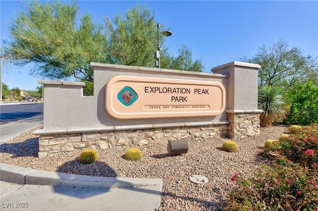 view of community sign