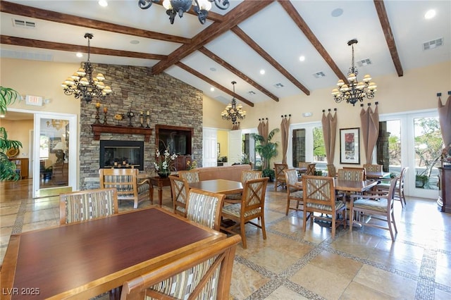 dining space featuring high vaulted ceiling, french doors, visible vents, and a notable chandelier