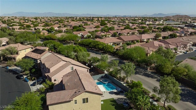 aerial view with a residential view and a mountain view