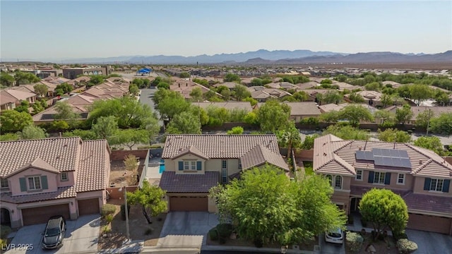 aerial view with a mountain view and a residential view