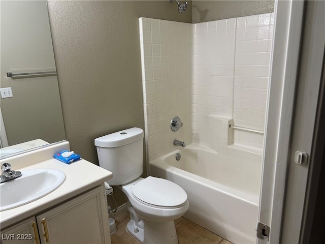 bathroom featuring a textured wall, tile patterned flooring, toilet, shower / bath combination, and vanity