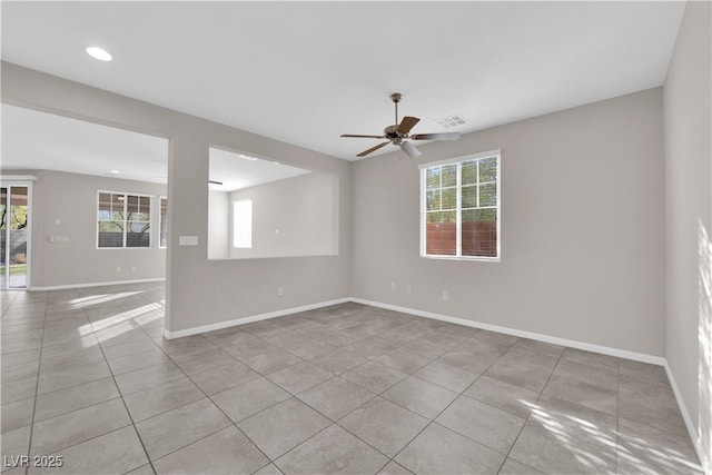 tiled empty room featuring recessed lighting, visible vents, ceiling fan, and baseboards