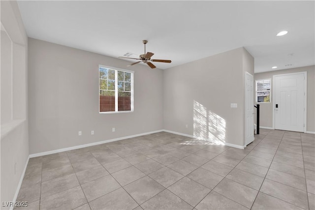 spare room with light tile patterned floors, recessed lighting, visible vents, a ceiling fan, and baseboards