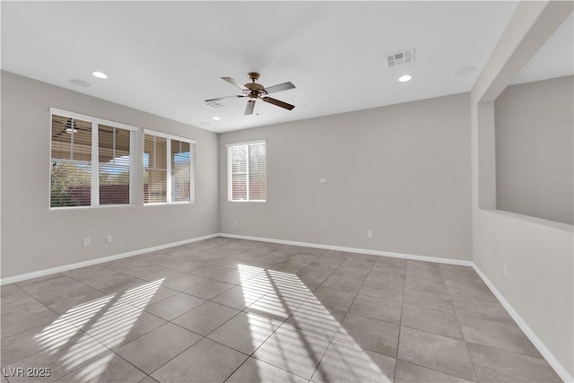 tiled spare room with recessed lighting, visible vents, ceiling fan, and baseboards