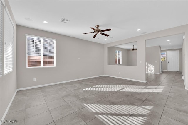 unfurnished room featuring baseboards, visible vents, ceiling fan, tile patterned floors, and recessed lighting