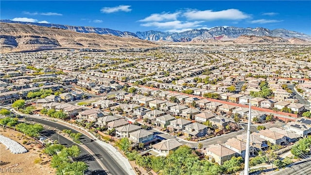 bird's eye view with a mountain view and a residential view