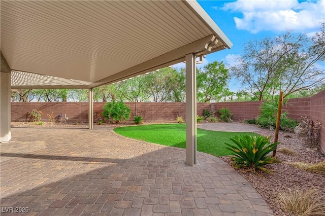 view of patio with a fenced backyard