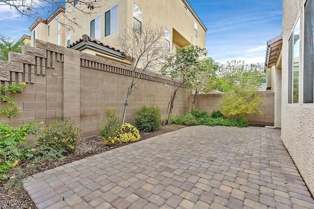 view of patio with a fenced backyard