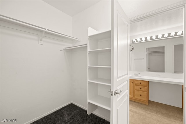 walk in closet with built in study area