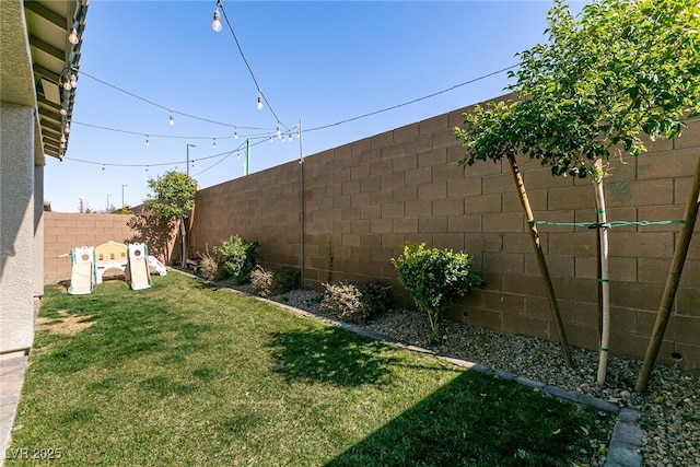 view of yard featuring a fenced backyard