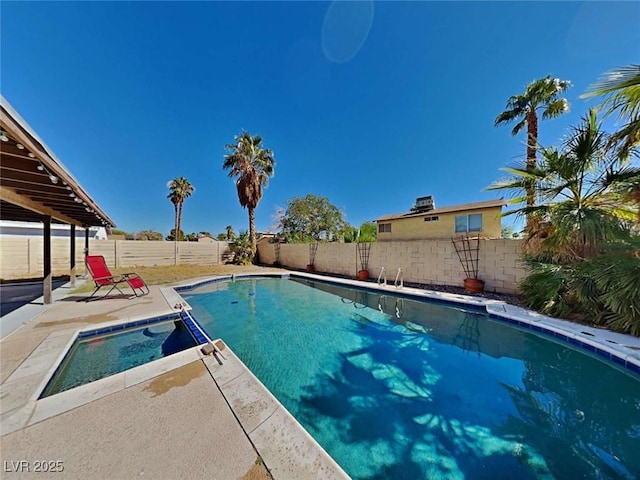 view of pool with a patio, a fenced backyard, and a fenced in pool