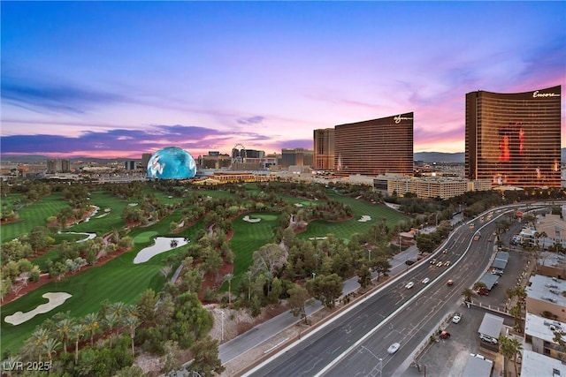 birds eye view of property with a city view