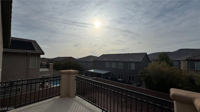 balcony featuring a residential view