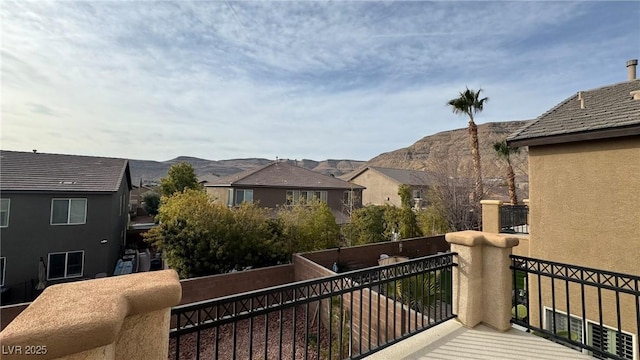 balcony featuring a mountain view