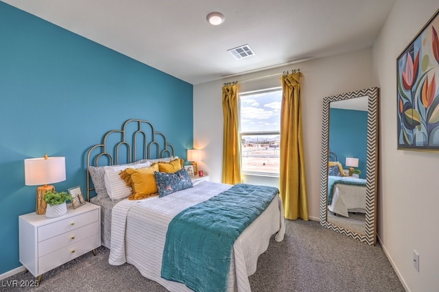 bedroom featuring carpet, visible vents, and baseboards