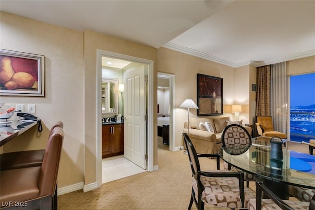 dining room featuring baseboards