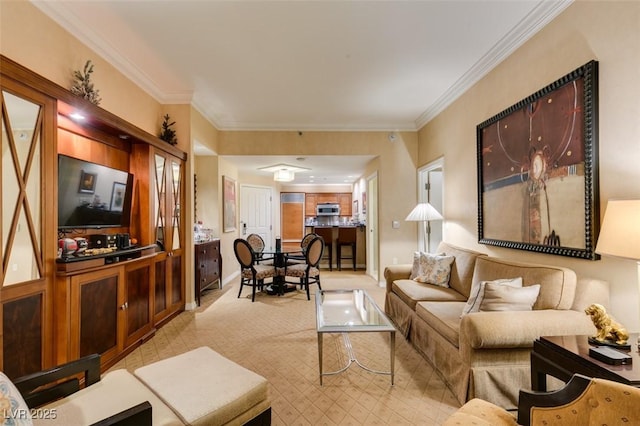 living room with baseboards and crown molding