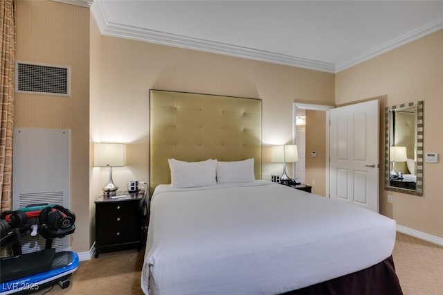 bedroom featuring baseboards, visible vents, and ornamental molding