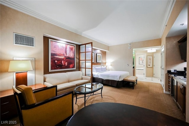 carpeted bedroom with visible vents and crown molding