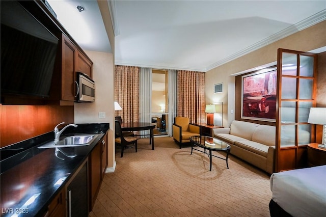 interior space featuring visible vents and crown molding