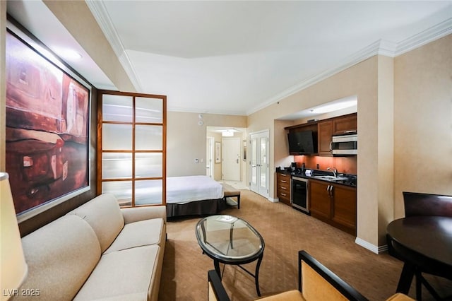 living area featuring light carpet, beverage cooler, baseboards, and crown molding