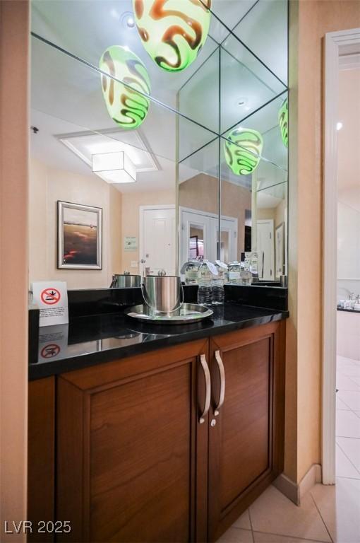 bathroom featuring vanity and tile patterned floors