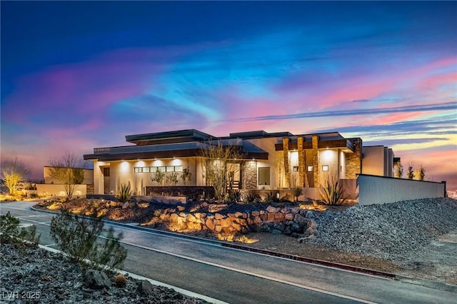 view of front of home featuring stucco siding