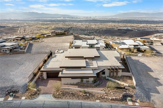 aerial view featuring a residential view and a mountain view