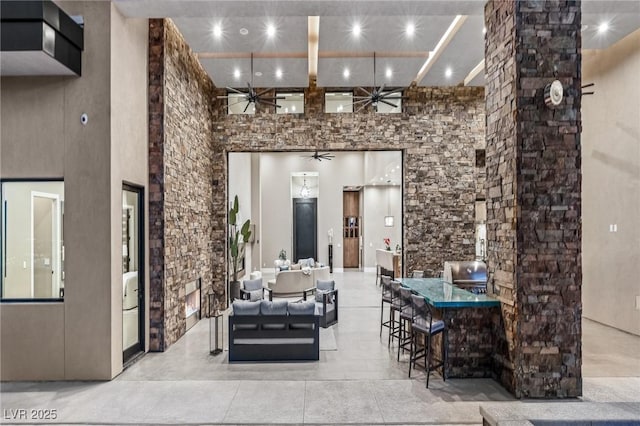 view of patio featuring an outdoor living space and ceiling fan