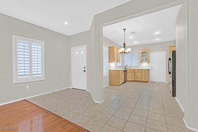 foyer entrance featuring baseboards, visible vents, an inviting chandelier, light wood-type flooring, and recessed lighting